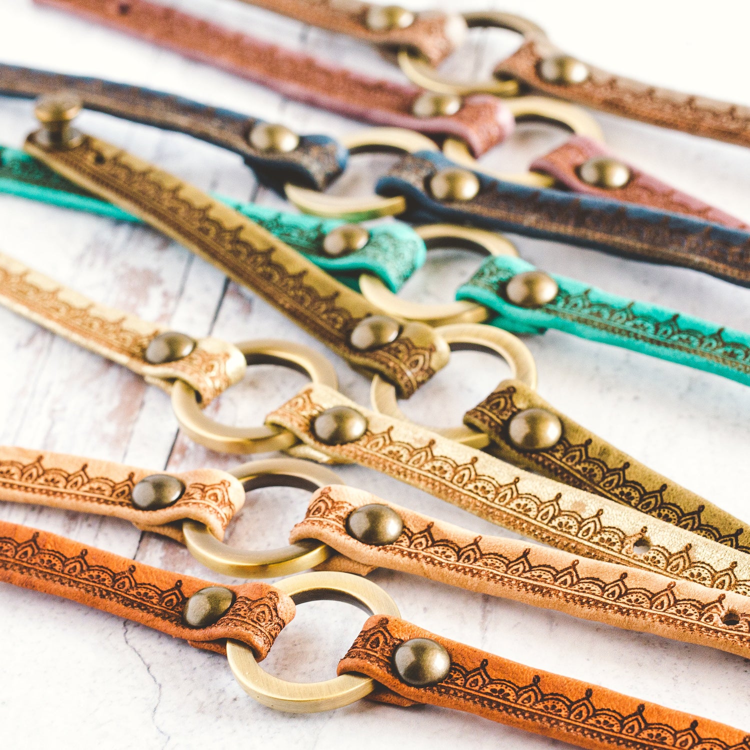 Group shot of leather bracelets with henna print