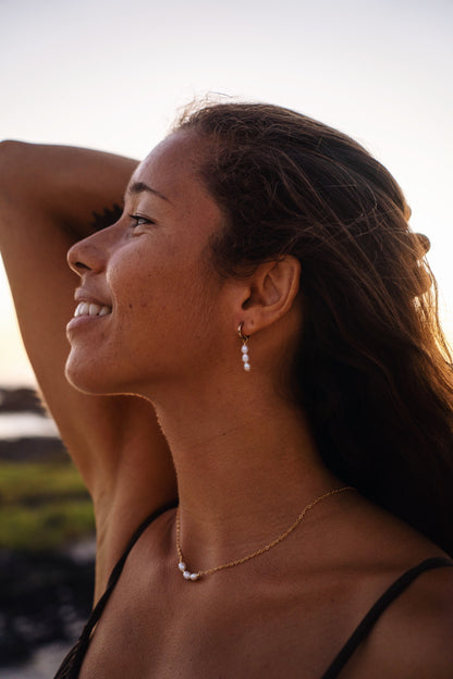 Gold Huggie Pearl Earrings